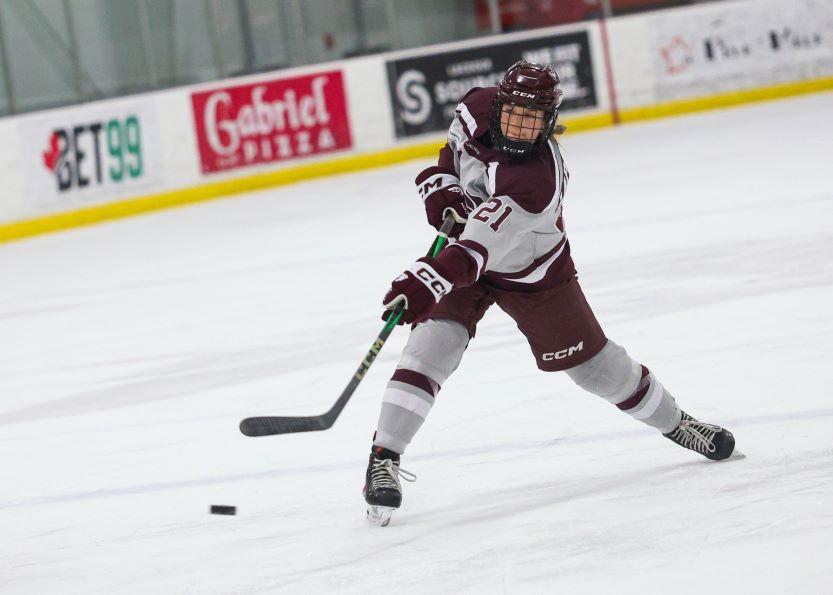 Women's hockey Gee Gees player Maelle Laplante, an OUA Second Team All-Star, takes a shot.