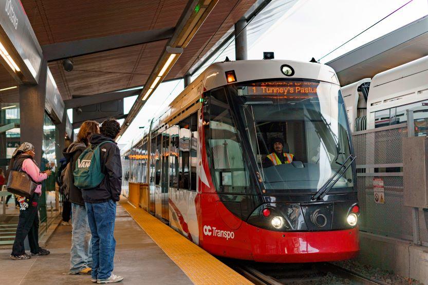 An LRT train pulling into Tunney's Pasture station