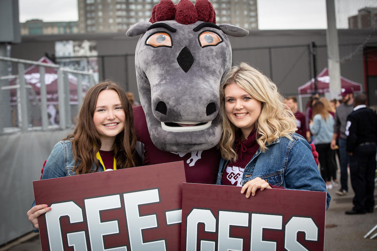 fans with Gee-Gees mascot