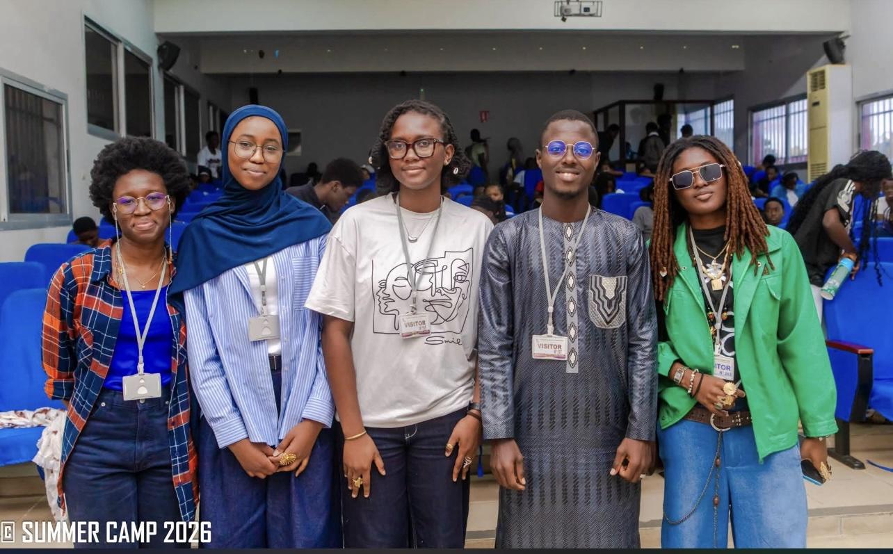 Kady Diarrassouba with four other writing workshop leaders.