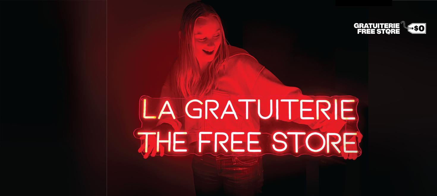 uOttawa student holding a neon Free Store sign looking amazed