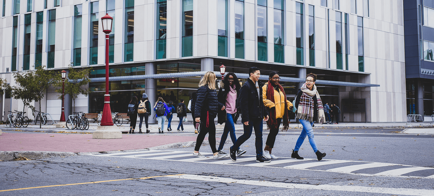 Group of students walking on campus