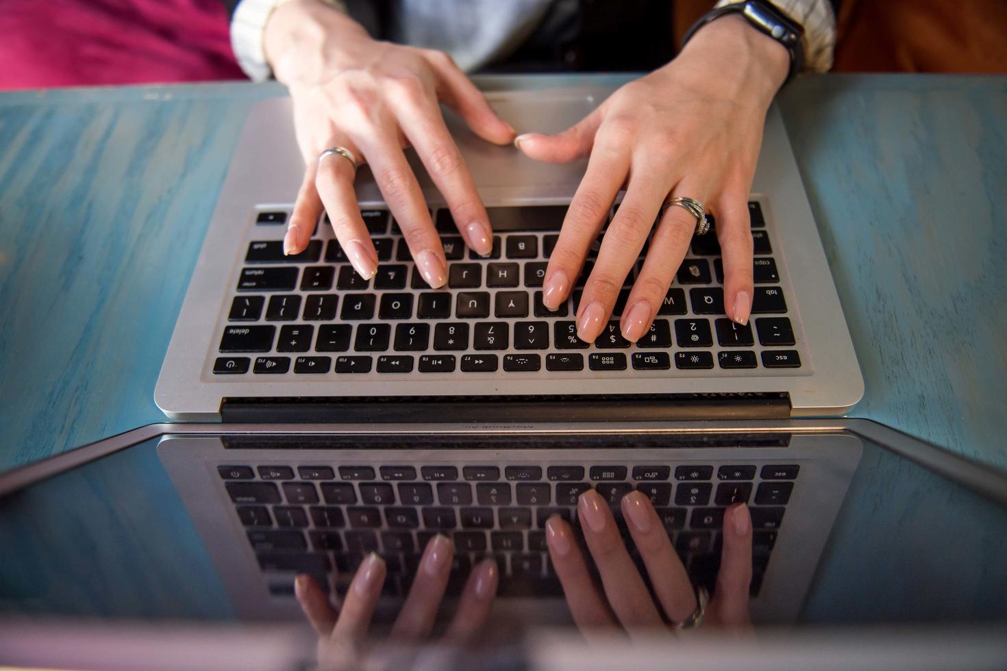 typing on a laptop