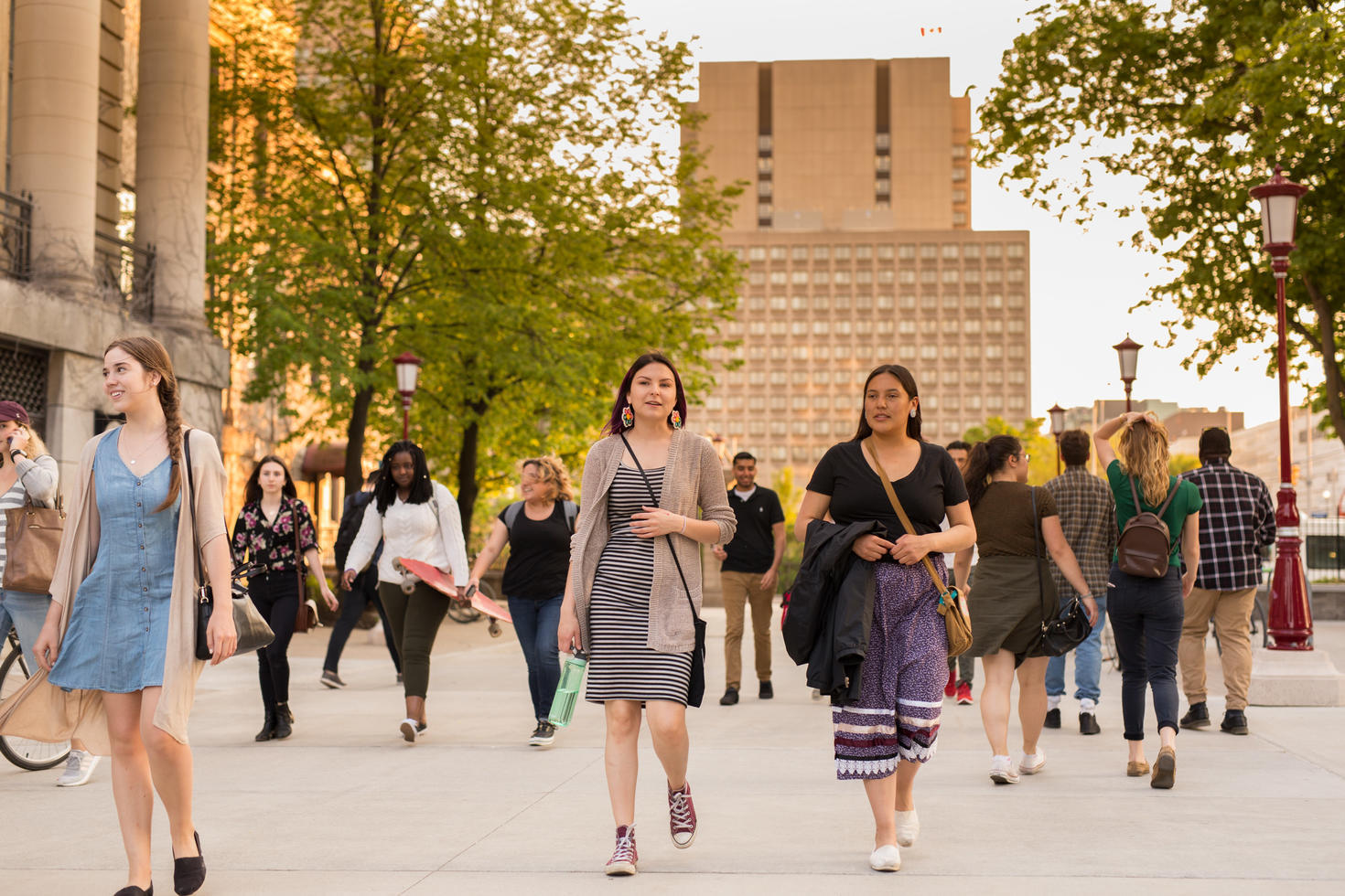 indigenous students walking on campus