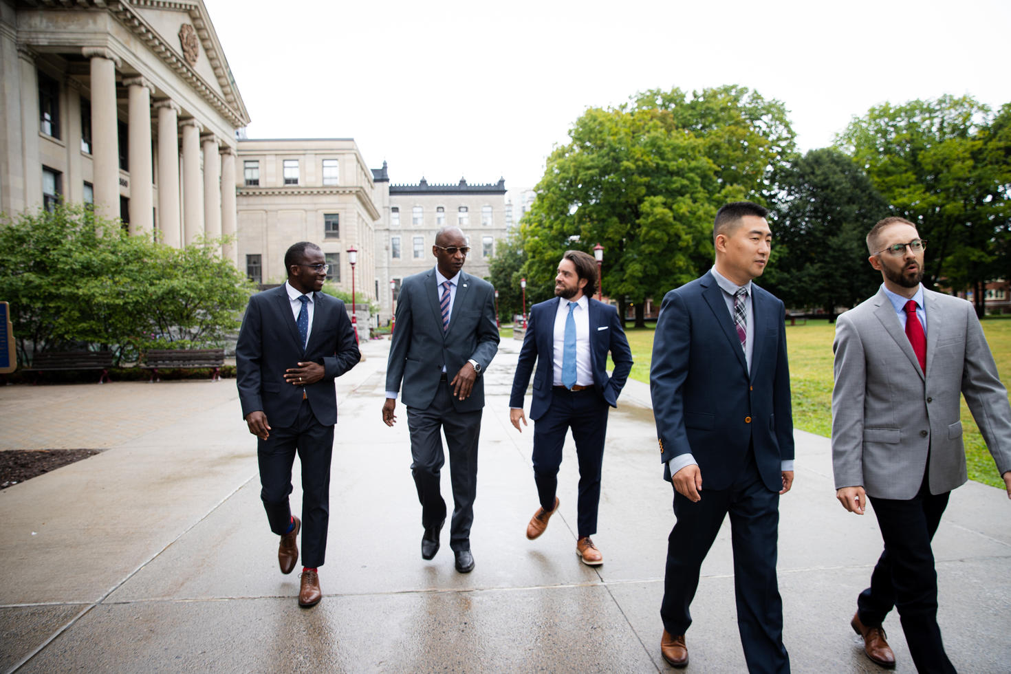 Members of the international recruitment team walking on campus