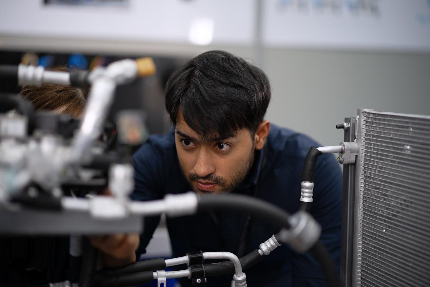 Student working in a mechanics lab