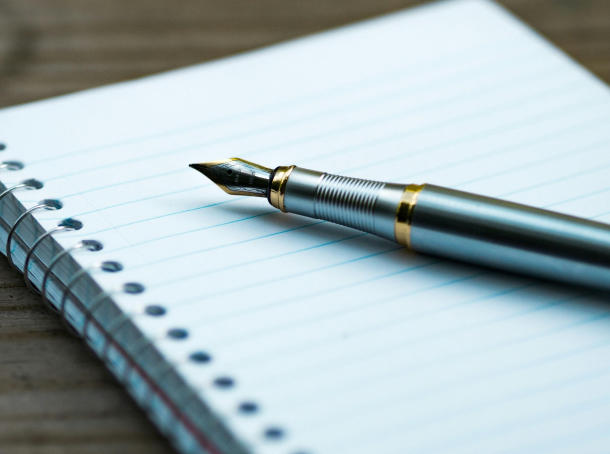 A pen on a notebook