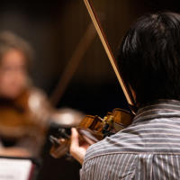 A student playing the violin