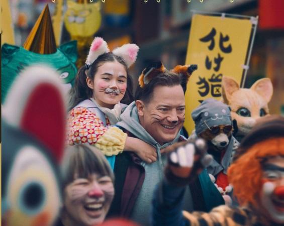 Une famille japonaise au milieu de la foule