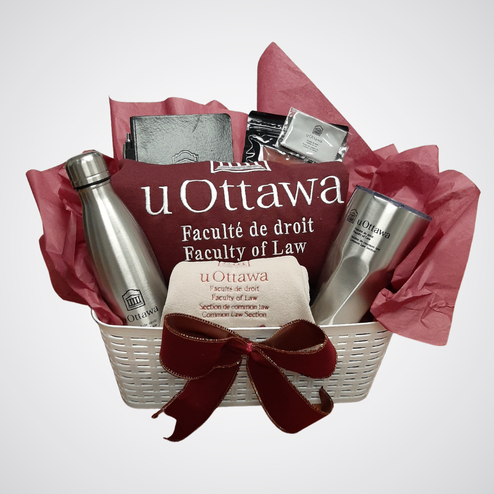 gift basket filled with Common Law embroidered and engraved items