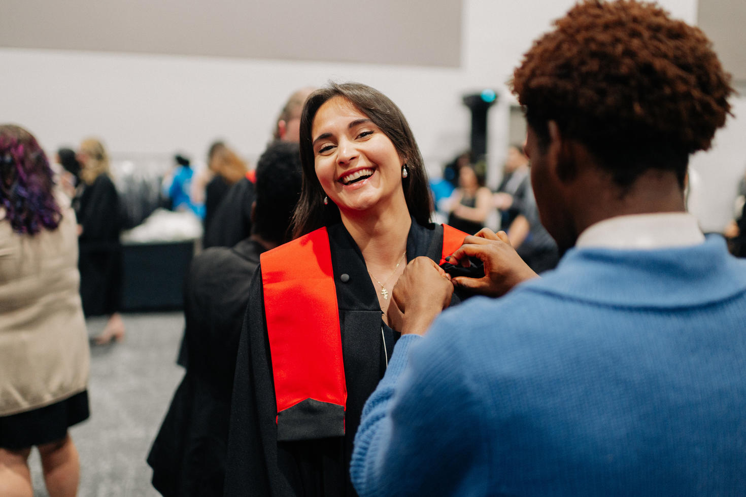 Female Graduate wearing regalia