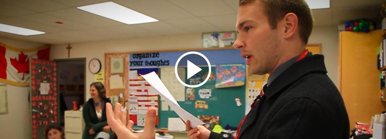 Teacher presenting in front of class