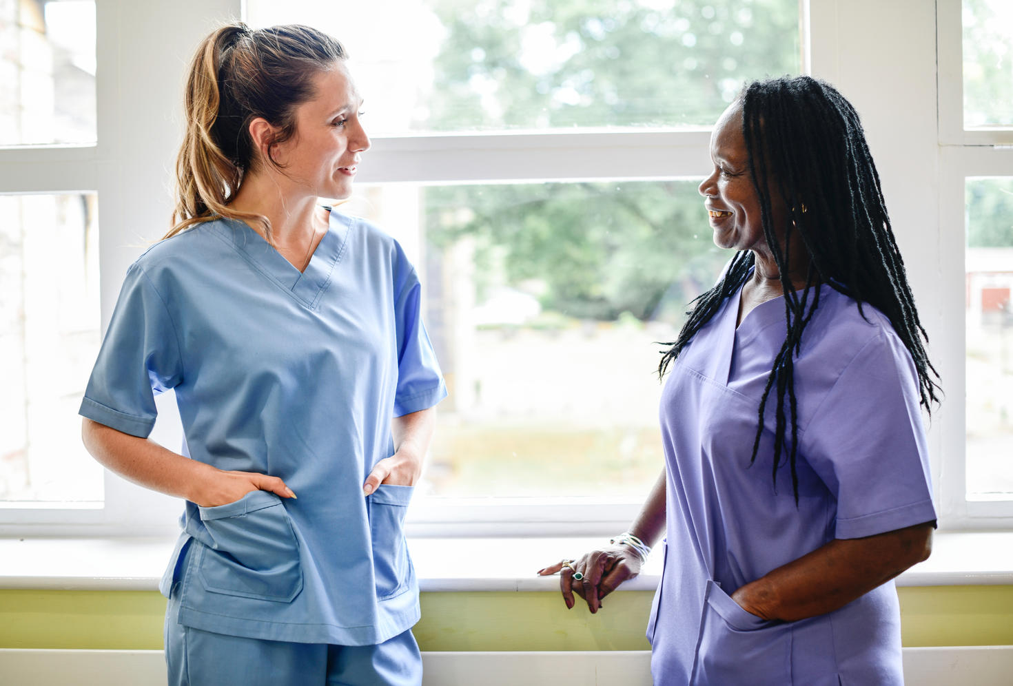 two nurses talking