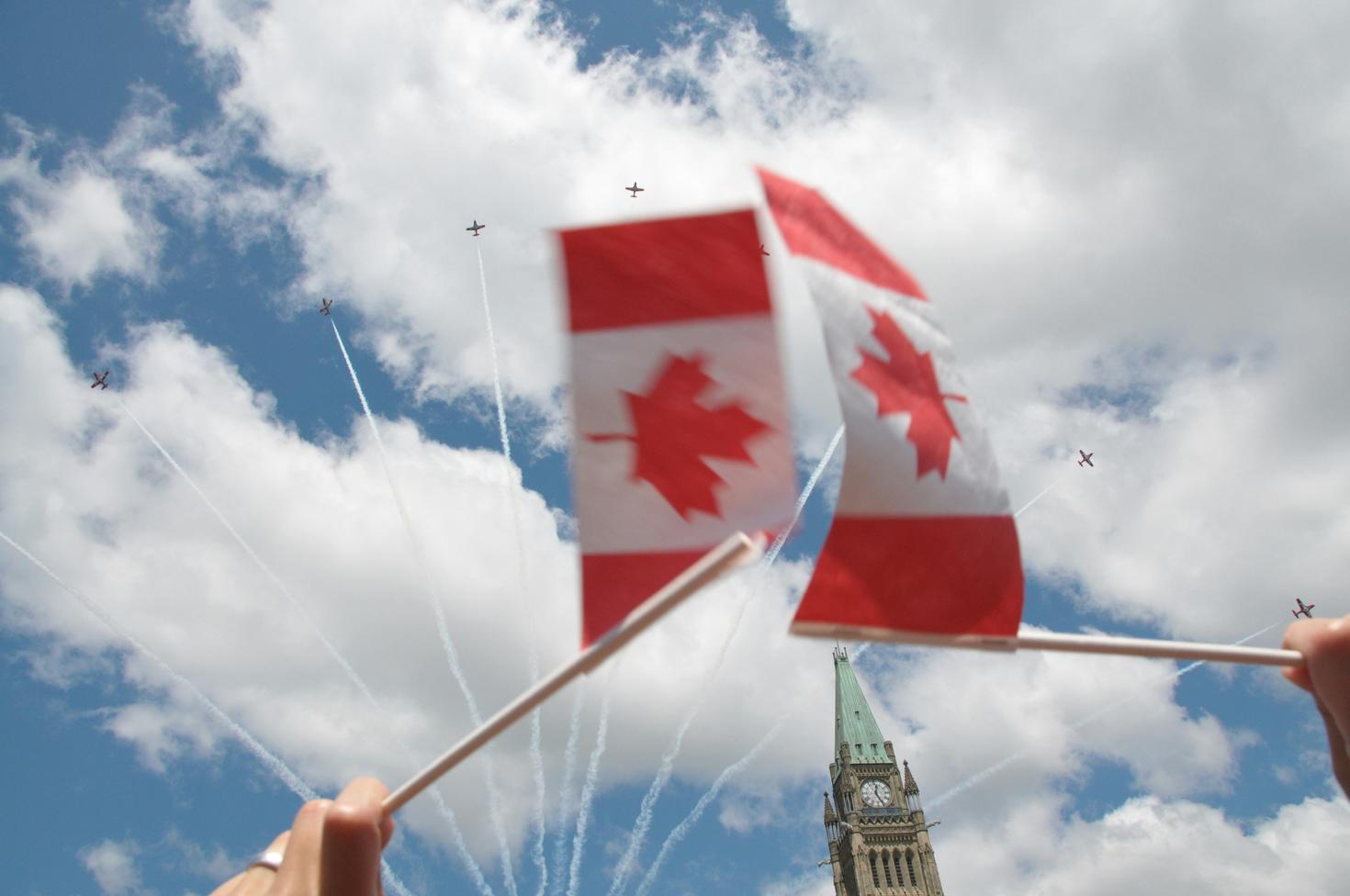 Canadian flags before Parliament