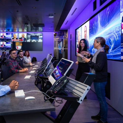 Group of people in a session at the uOttawa-IBM Cyber Range.