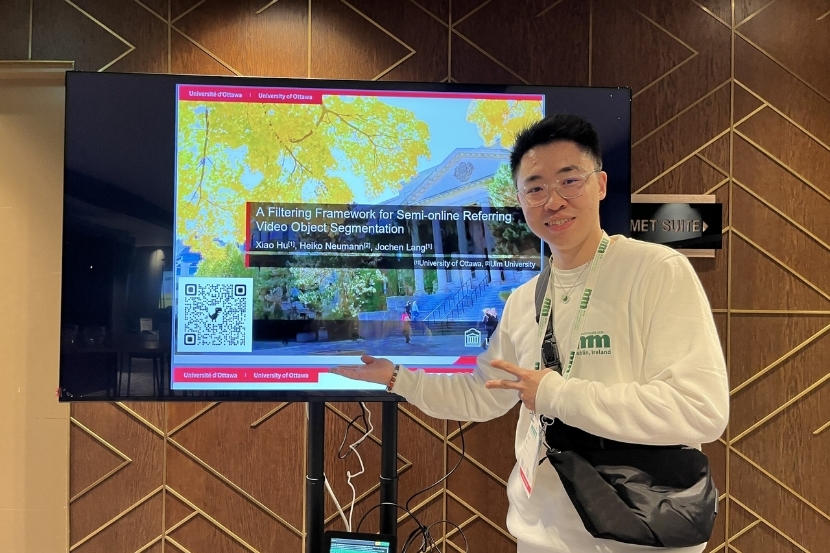Xiao Hu et sa présentation.