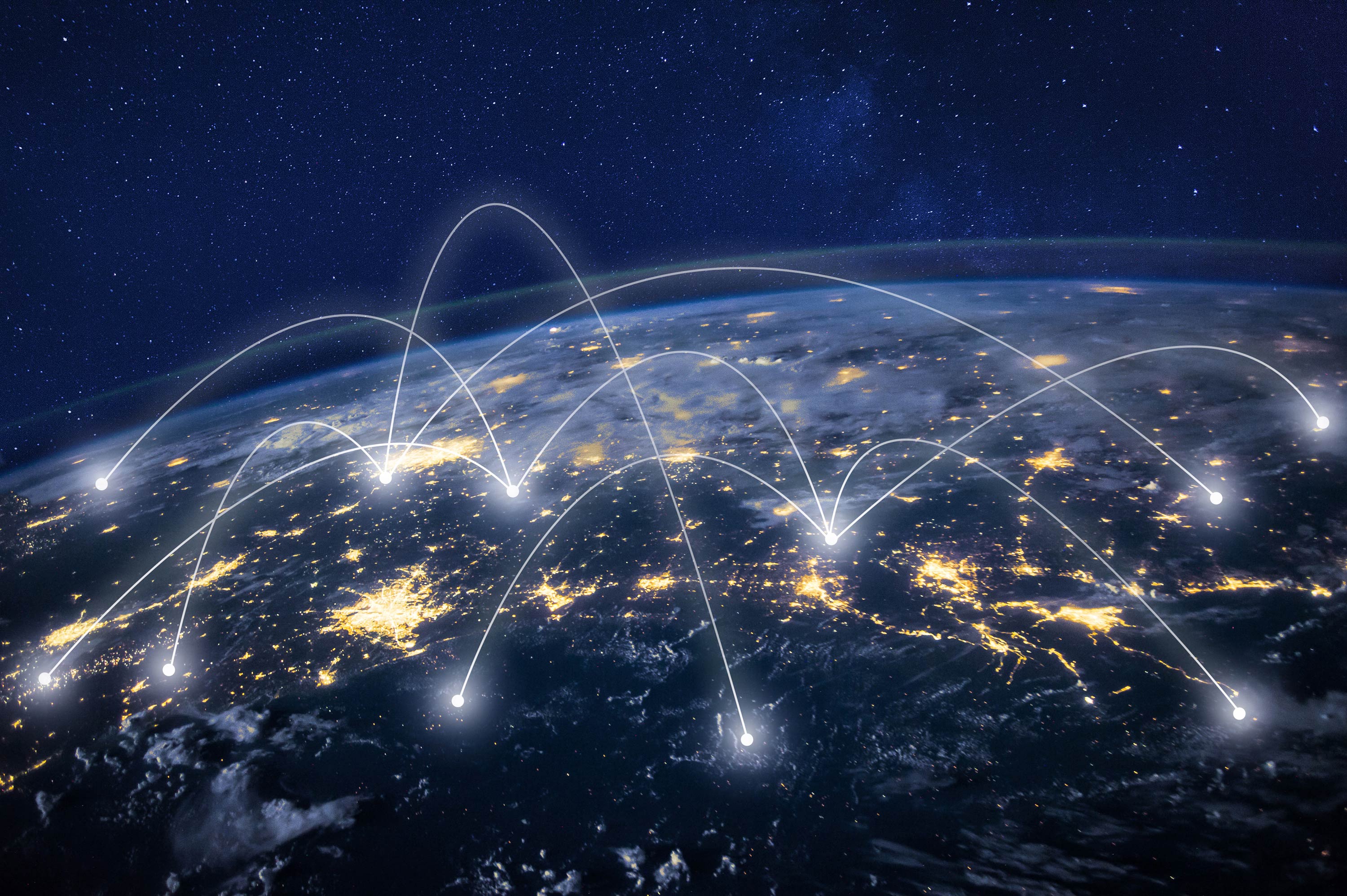 La terre avec des rayons de lumière connectent les villes