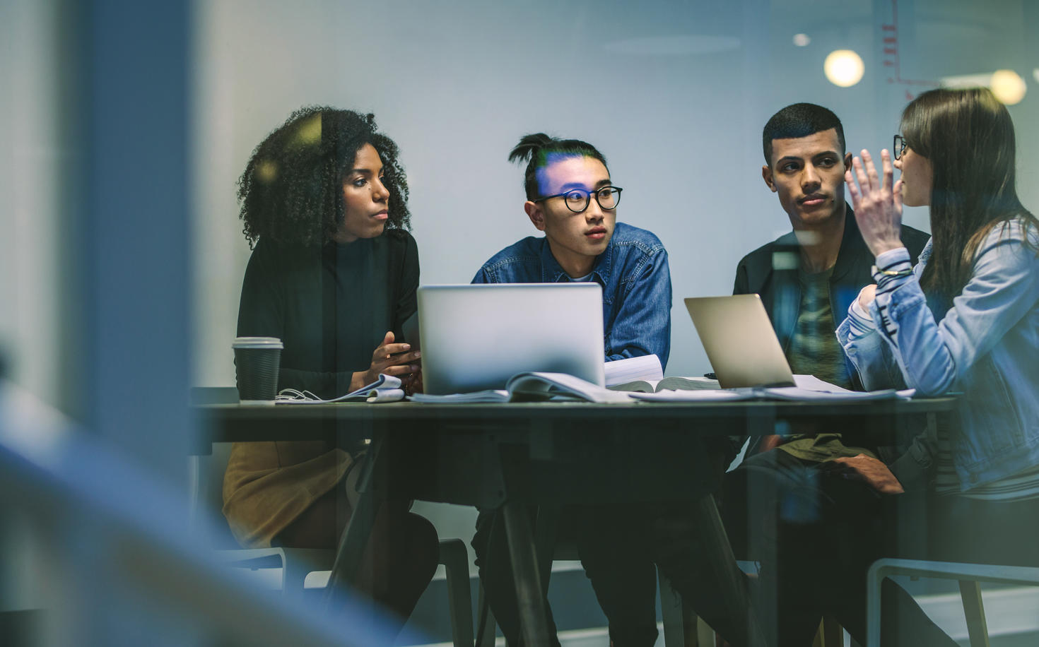 group of students discussing an assignment