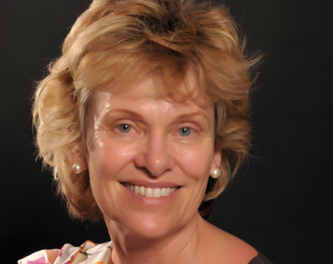 Dr. Huston headshot, smiling into camera