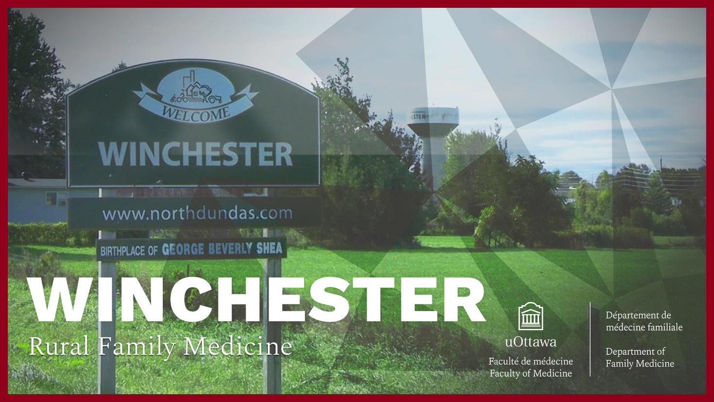 Un panneau vert indiquant « Bienvenue à Winchester » au bord d'une autoroute, avec des champs verts en arrière-plan.