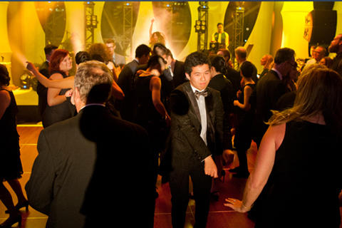 Photo of Dragonette performing to a packed dance floor at Saturday’s Abracadabra gala