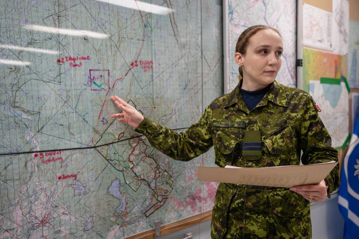 A person pointing at a map