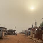 Cloudy sky overlooking Ghanaian street