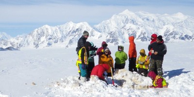 People standing in the snow. 