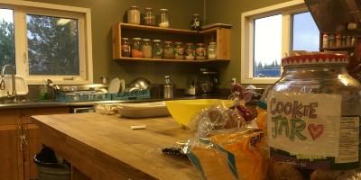 Kitchen with food on table.