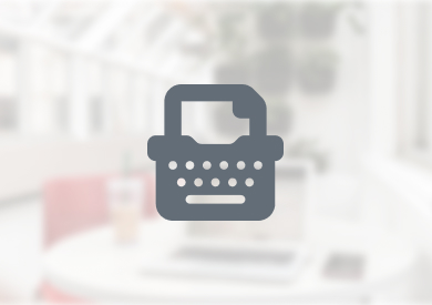 Typewriter icon on a blurred background