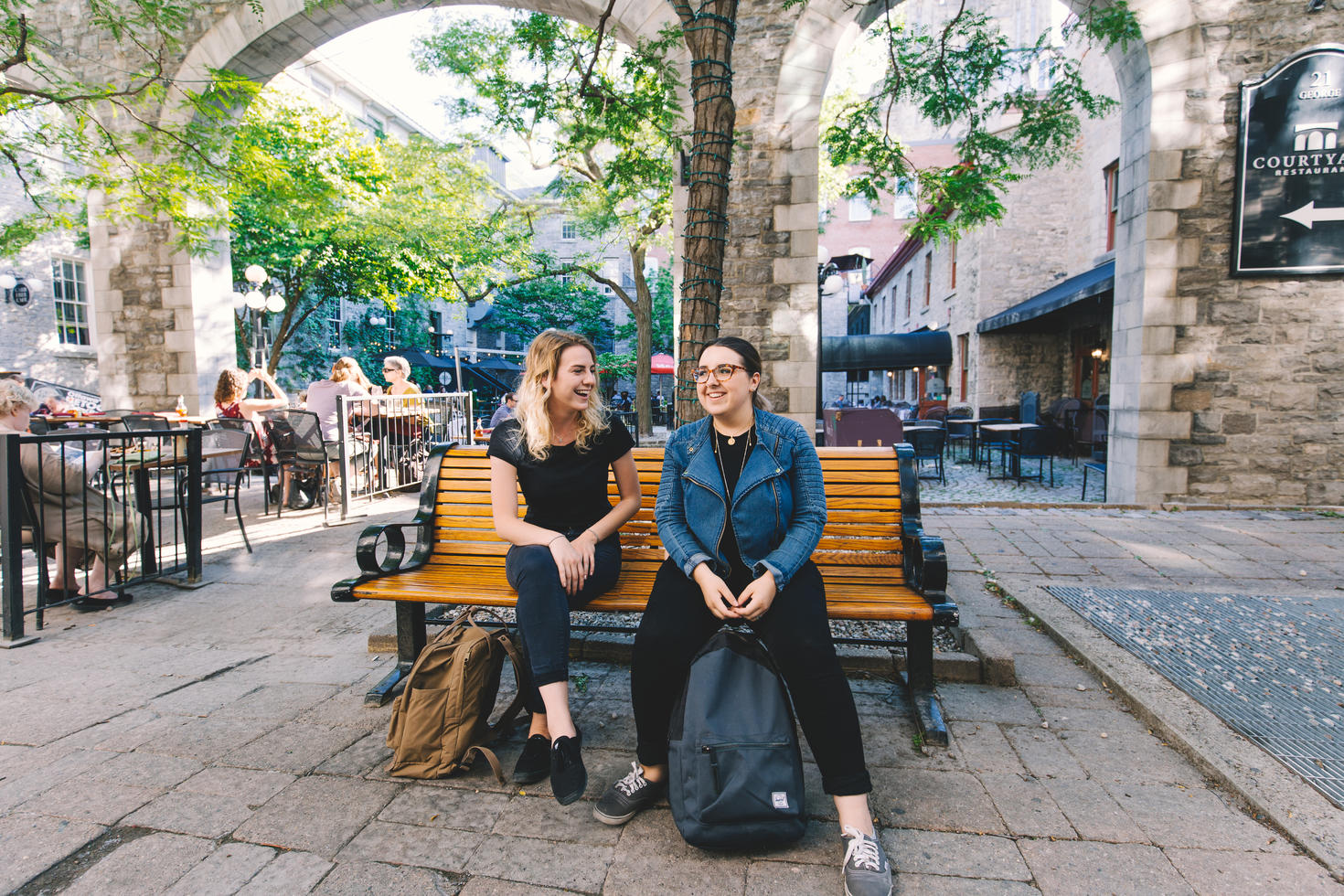 Students sitting on a bench