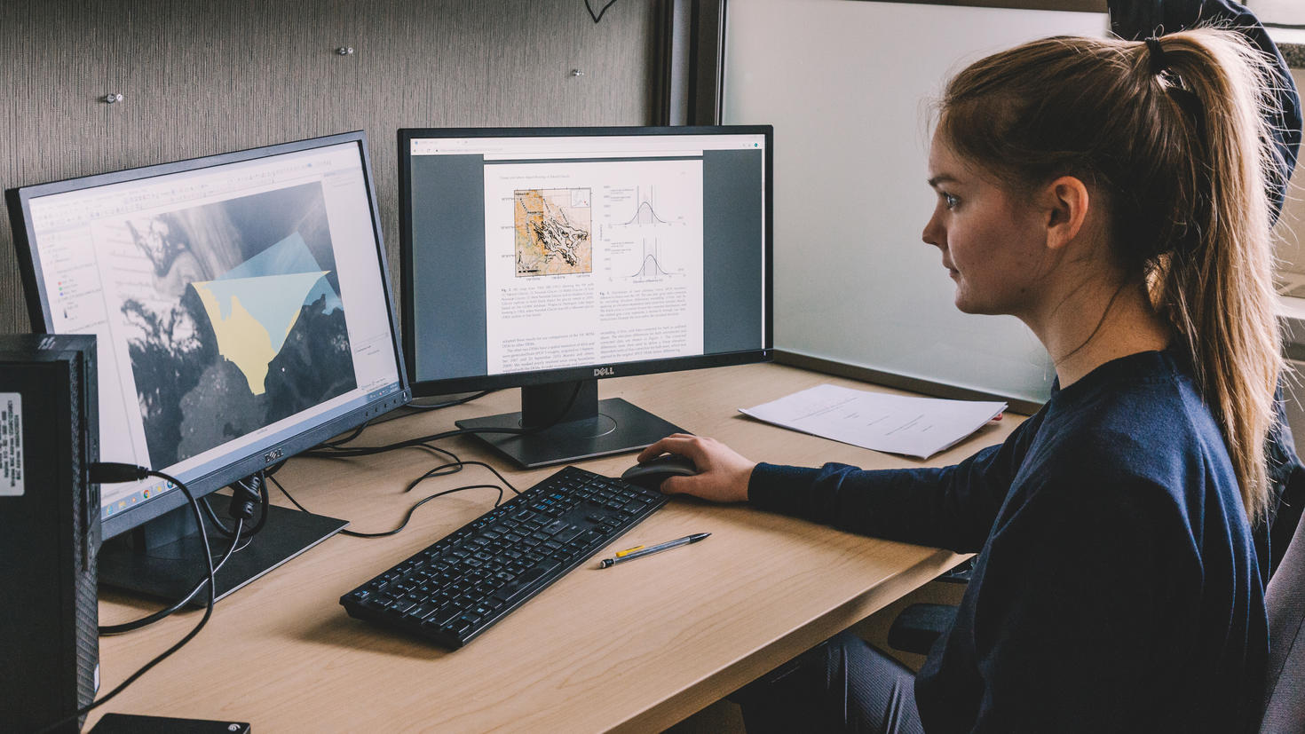 a girl who is on a computer