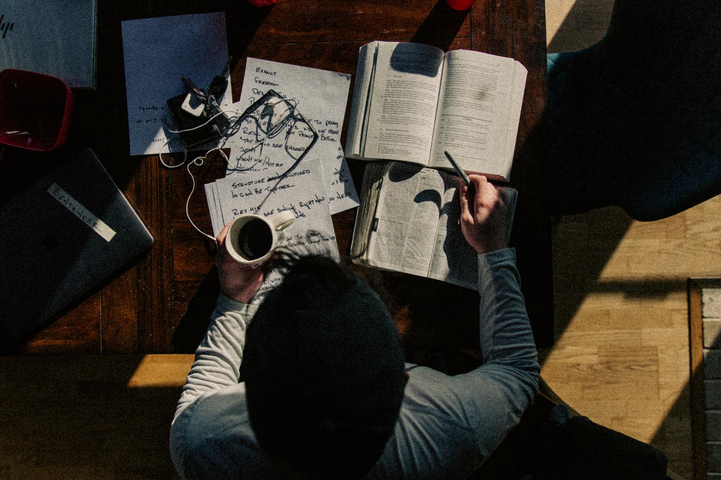 View from above of someone working at a table