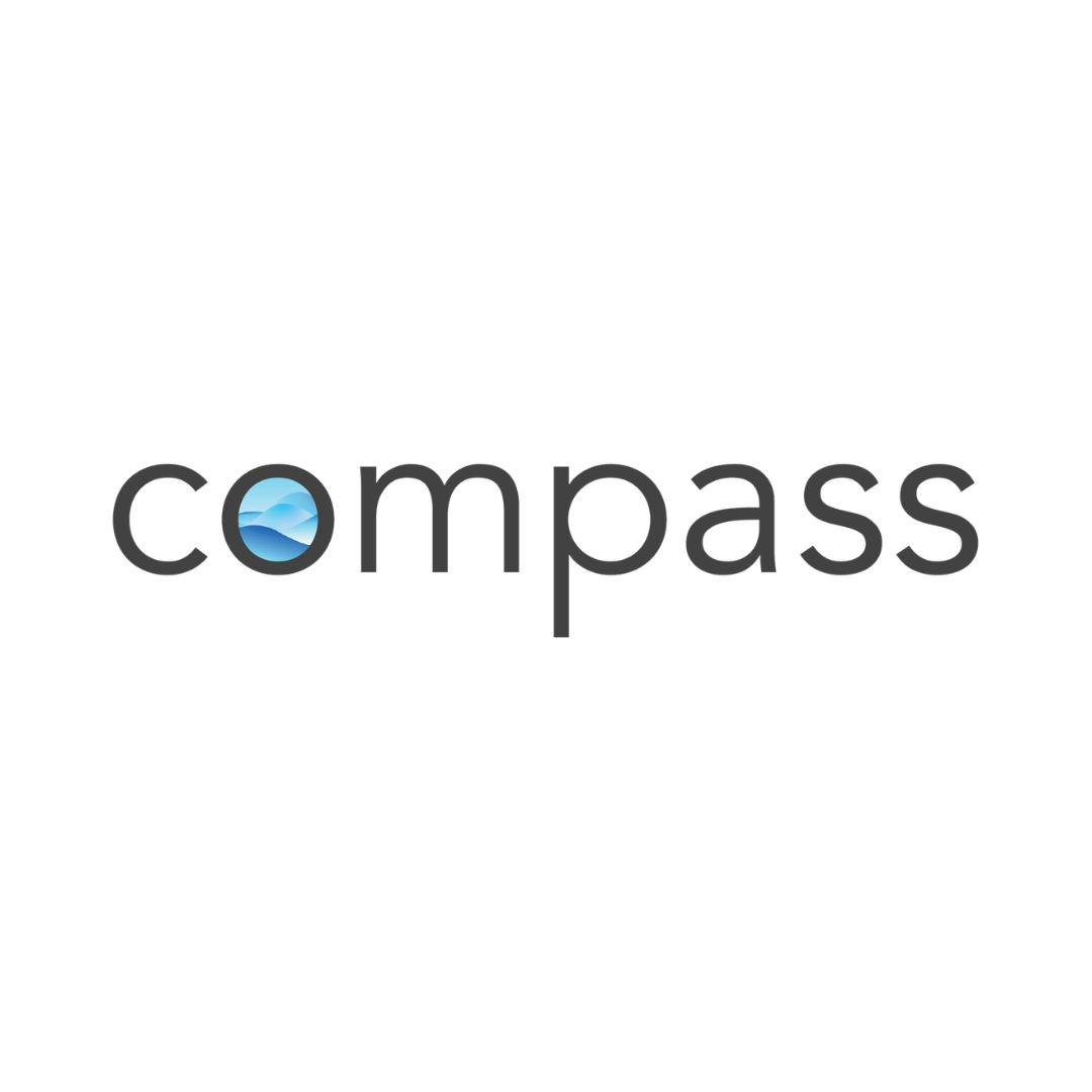 Logo of the compass site on a white background, contains the word compass written in black with a blue sea inside of the letter o.