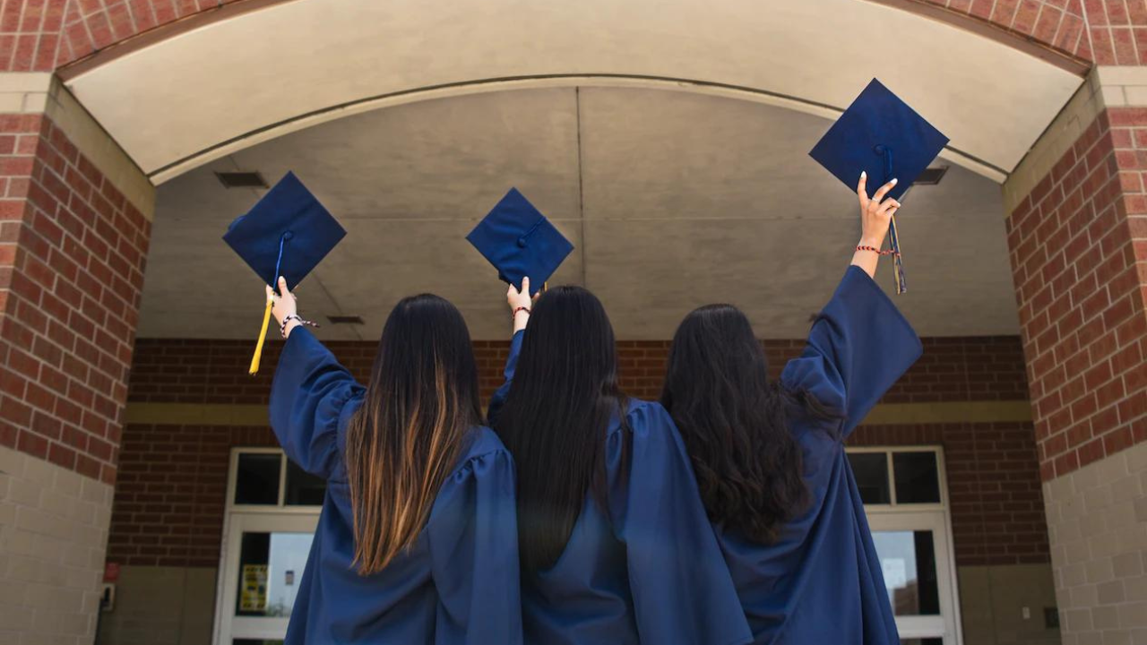 Three graduates from the back