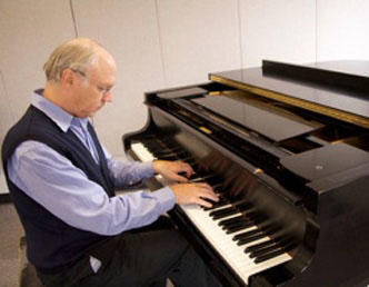 Steven Gellman playing the piano