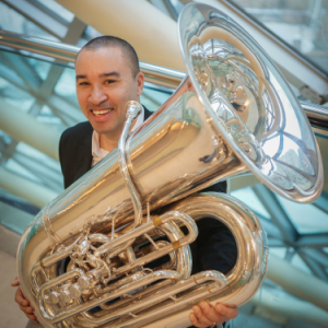 Chris Lee portrait with a Tuba