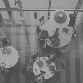 Overhead view of students sitting at tables