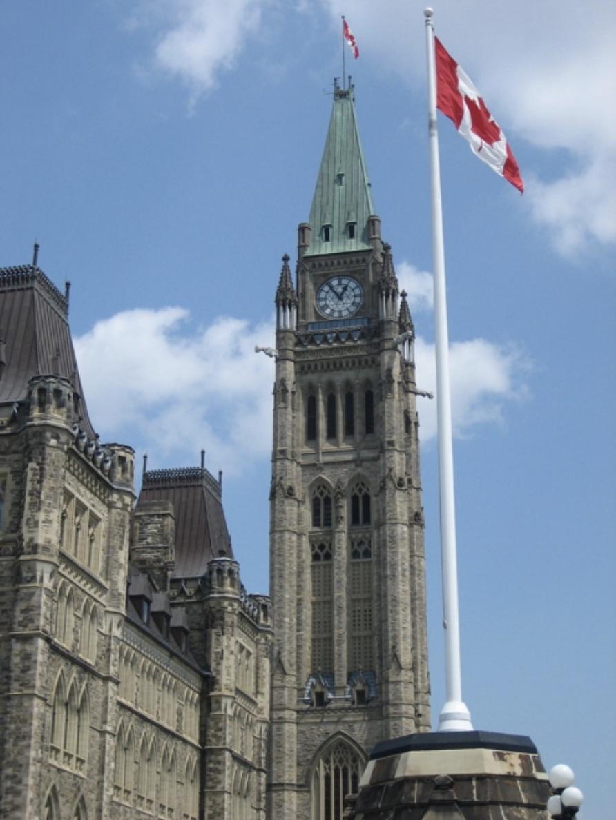 Parliament Hill with Canadian Flag