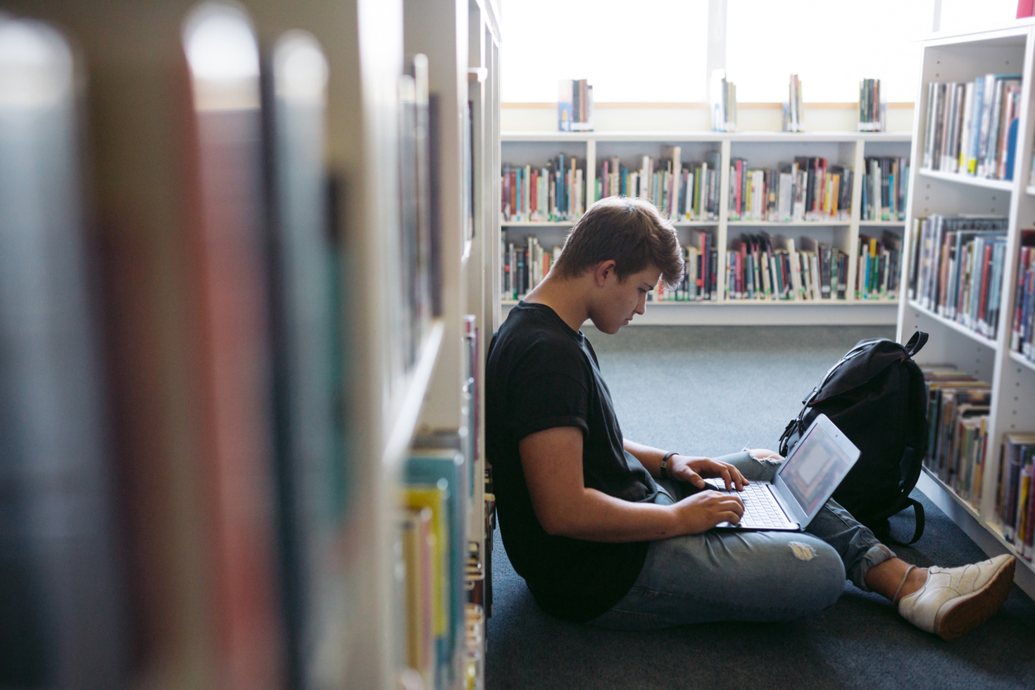 Student in library on floor