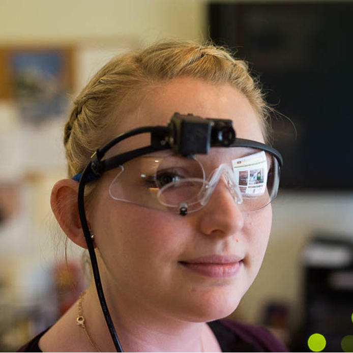 Person with camera on the top of their glasses.