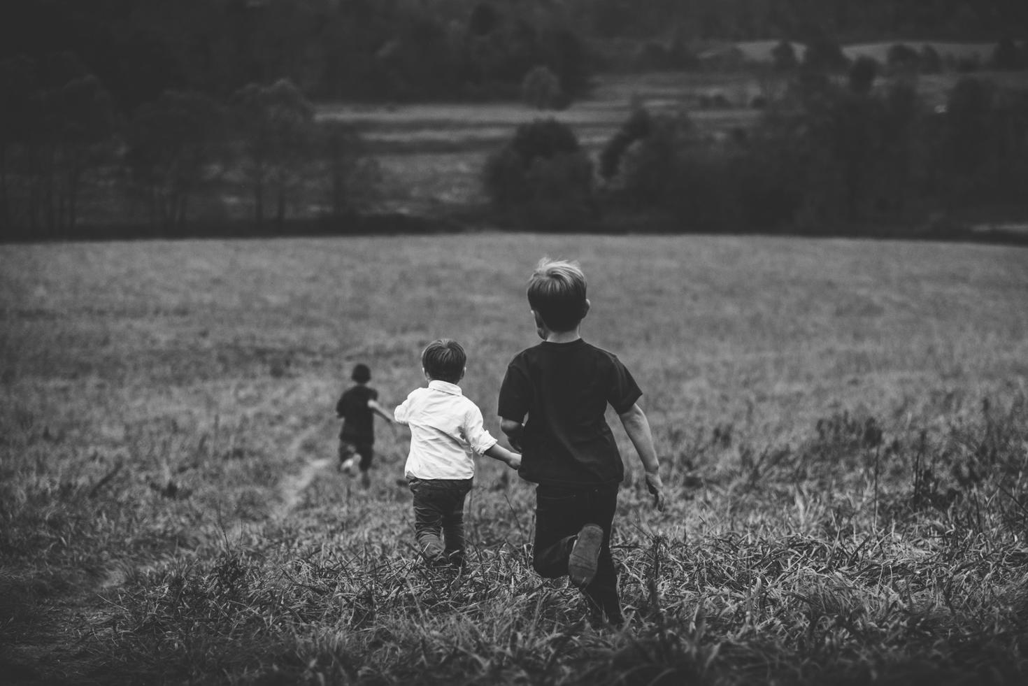 Kids running on a field