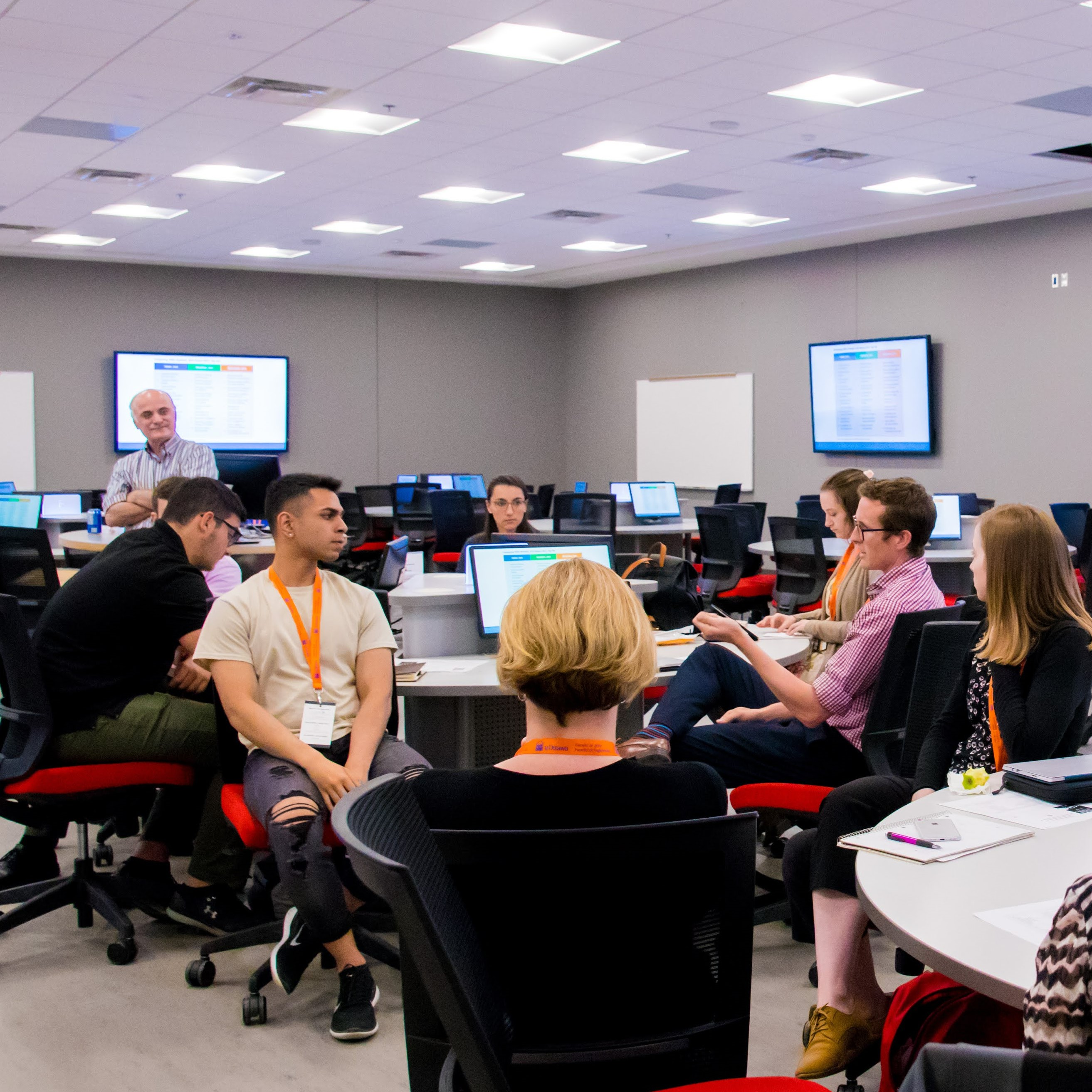 Group of people discussing during a conference.