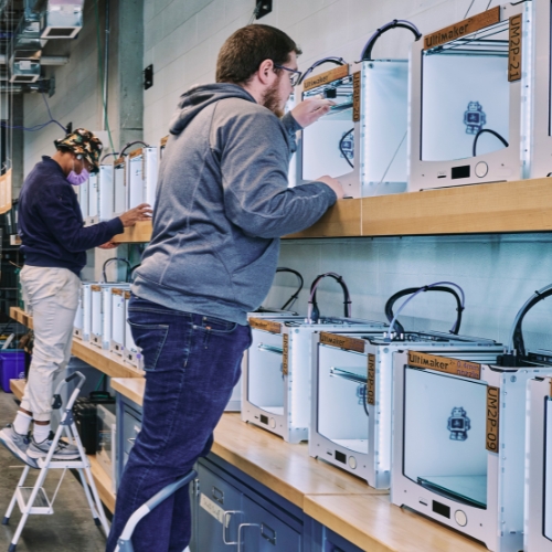 Wall of 3D printers.
