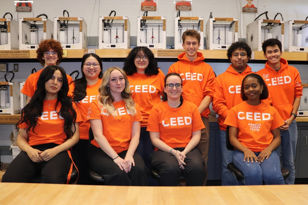 Smiling CEED staff in the Makerspace.