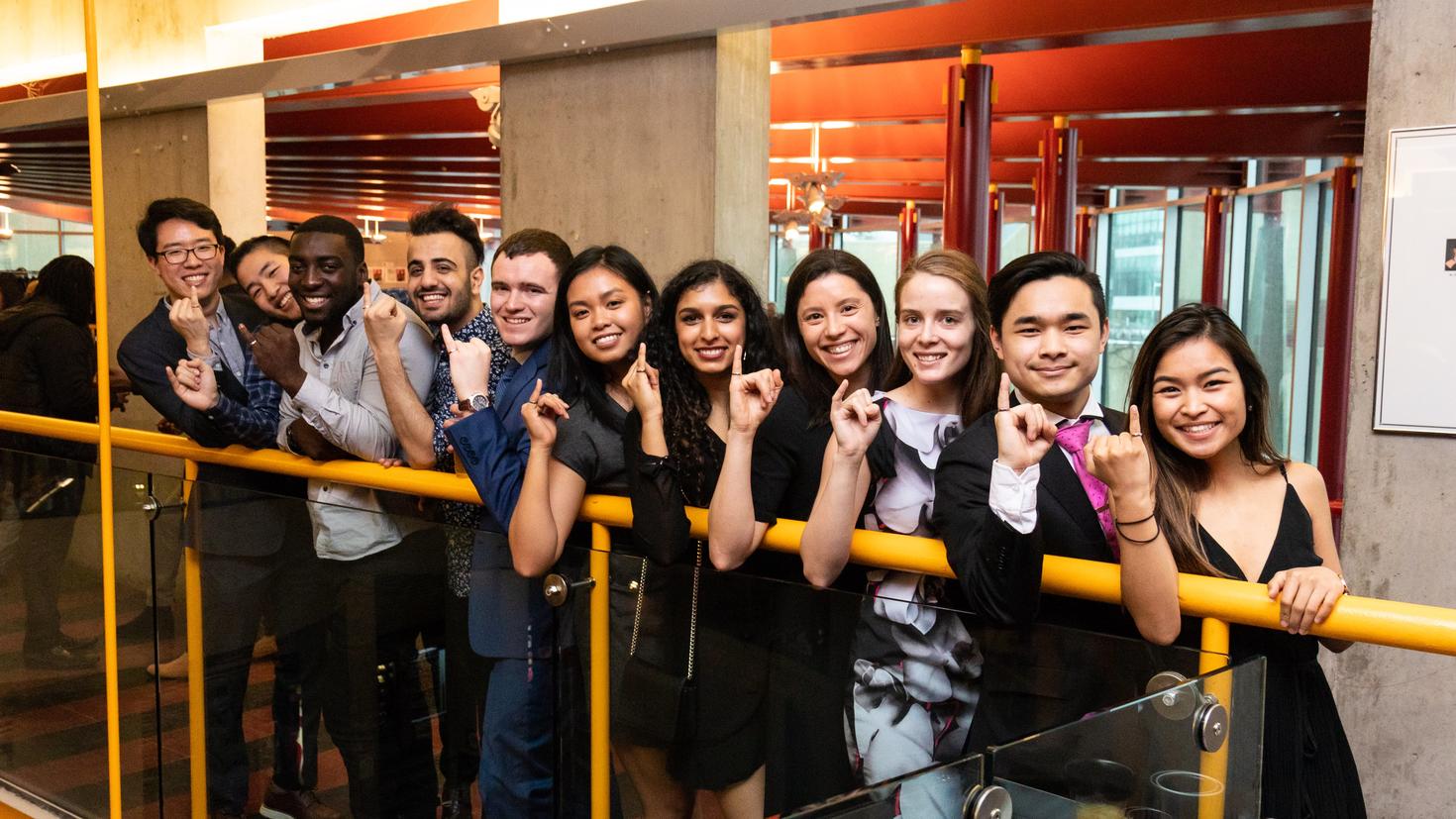 Students showing their iron ring.