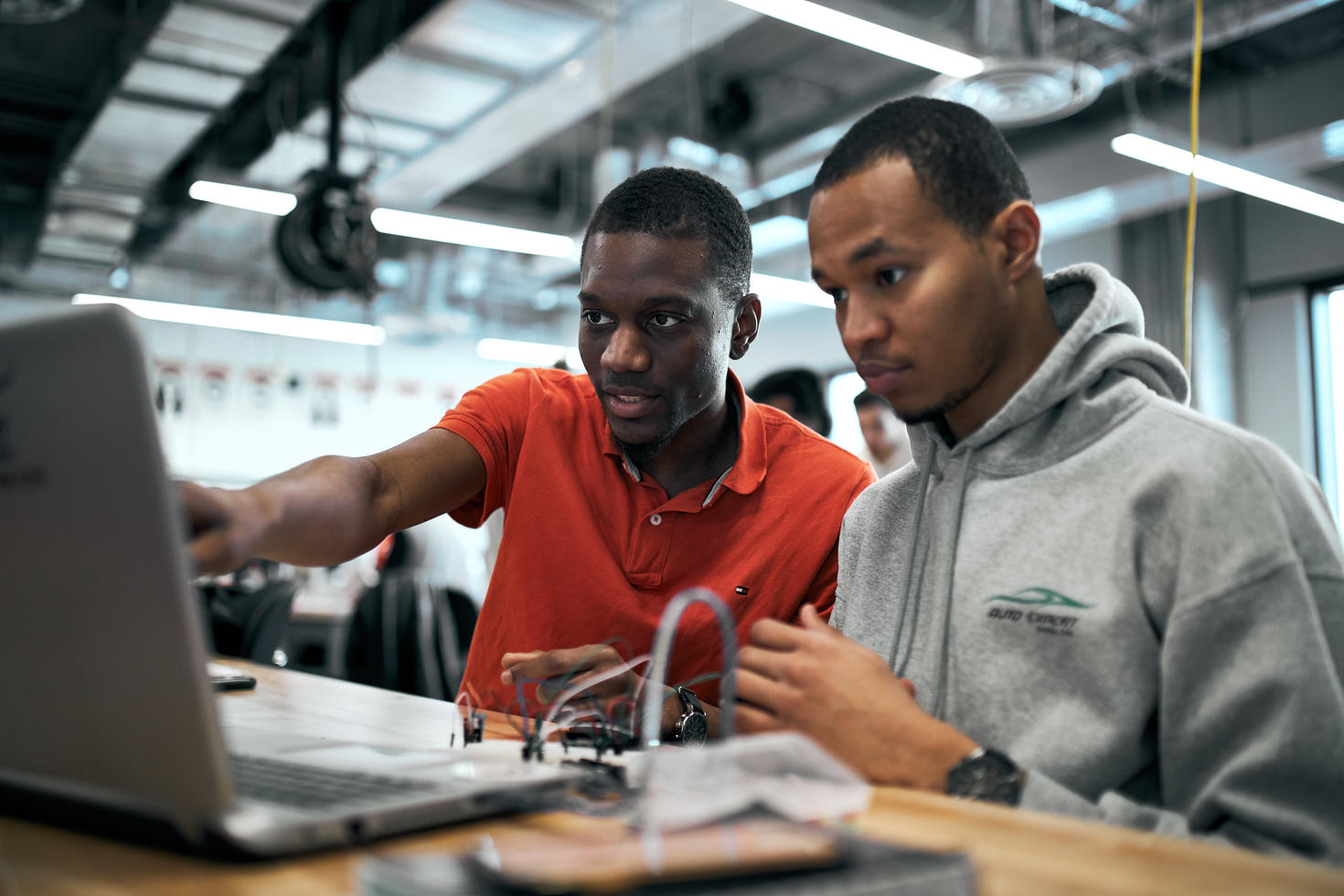 Two students working.