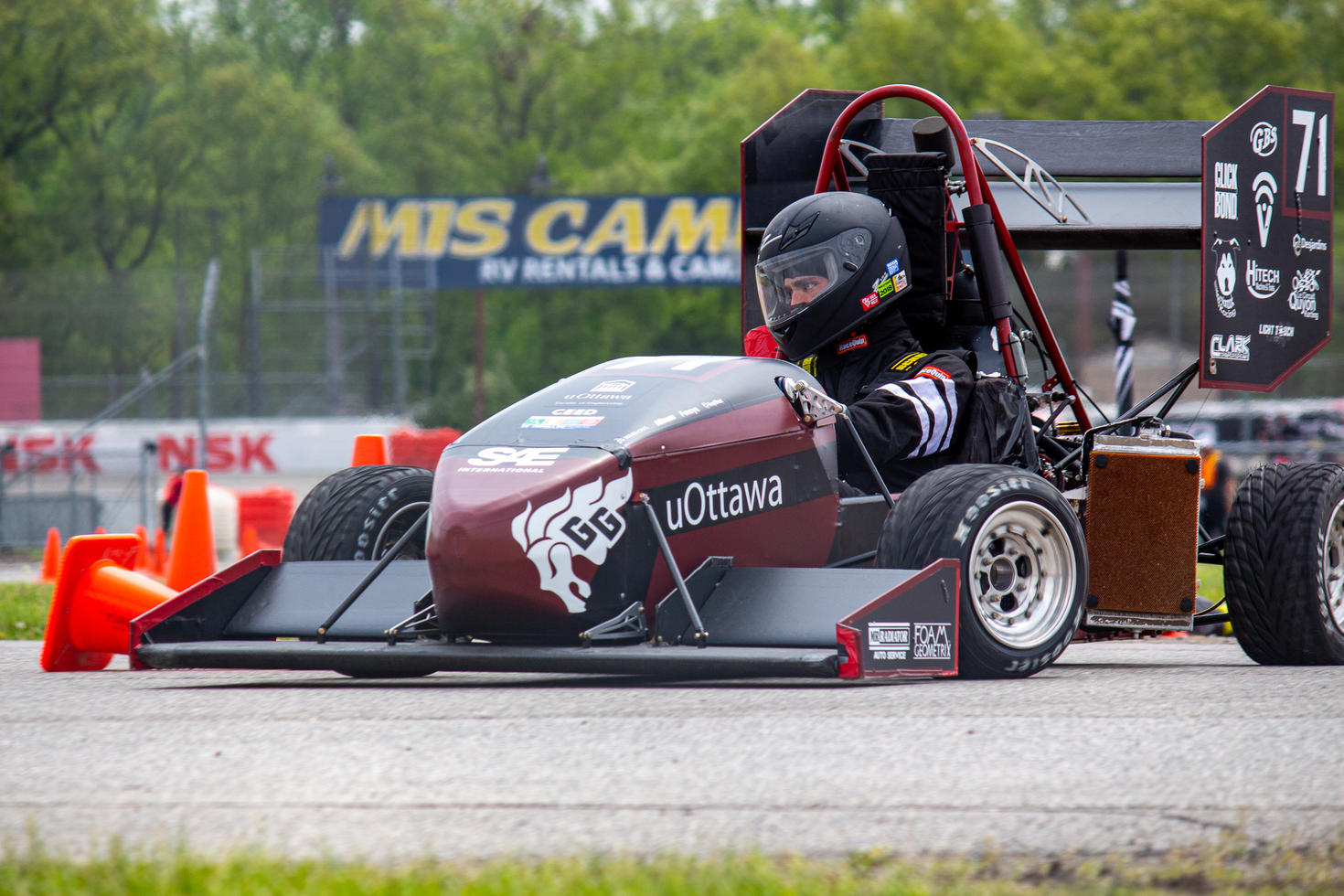 Formula uOttawa car on the track.