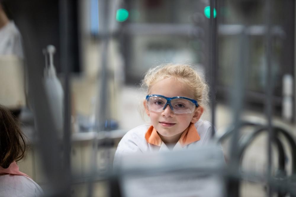 Young child in engineering lab.