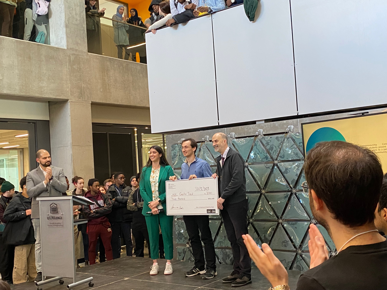 Second place winner receiving cheque